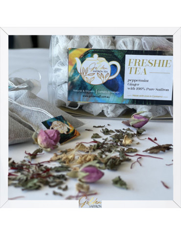 A cup of refreshing Freshie tea with saffron and herbs